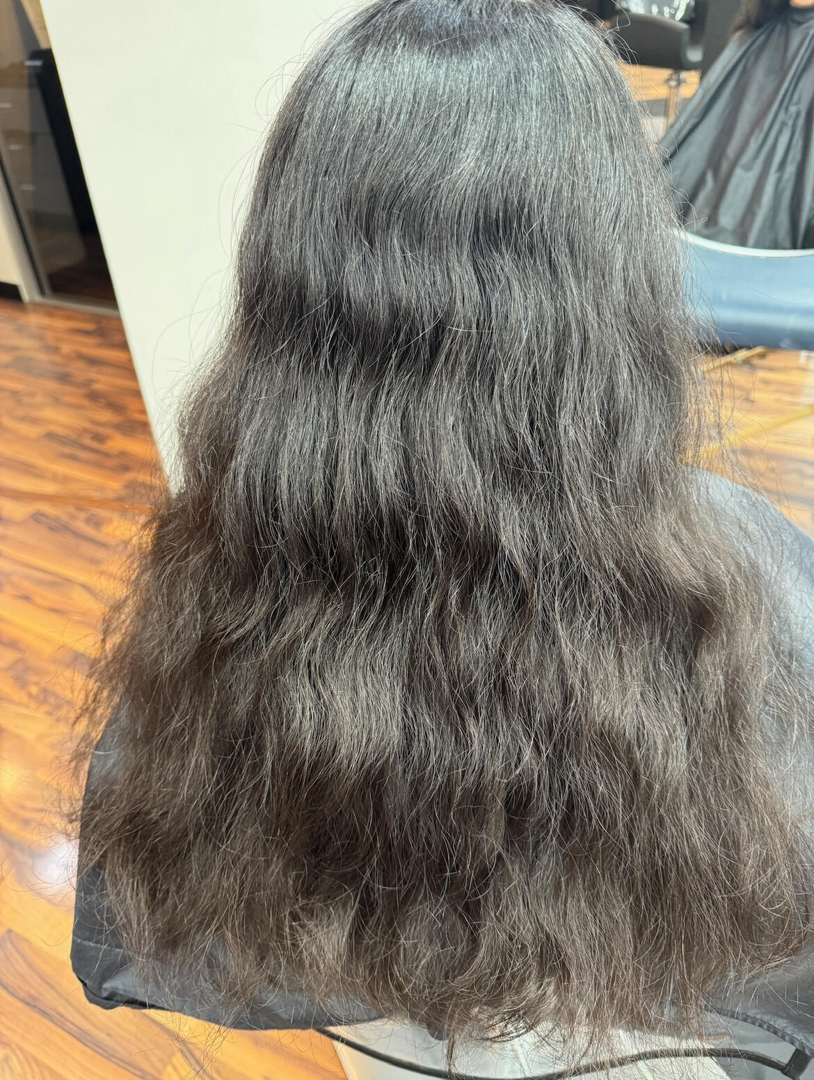 A client's hair style before an appointment at Hair Loft Salon