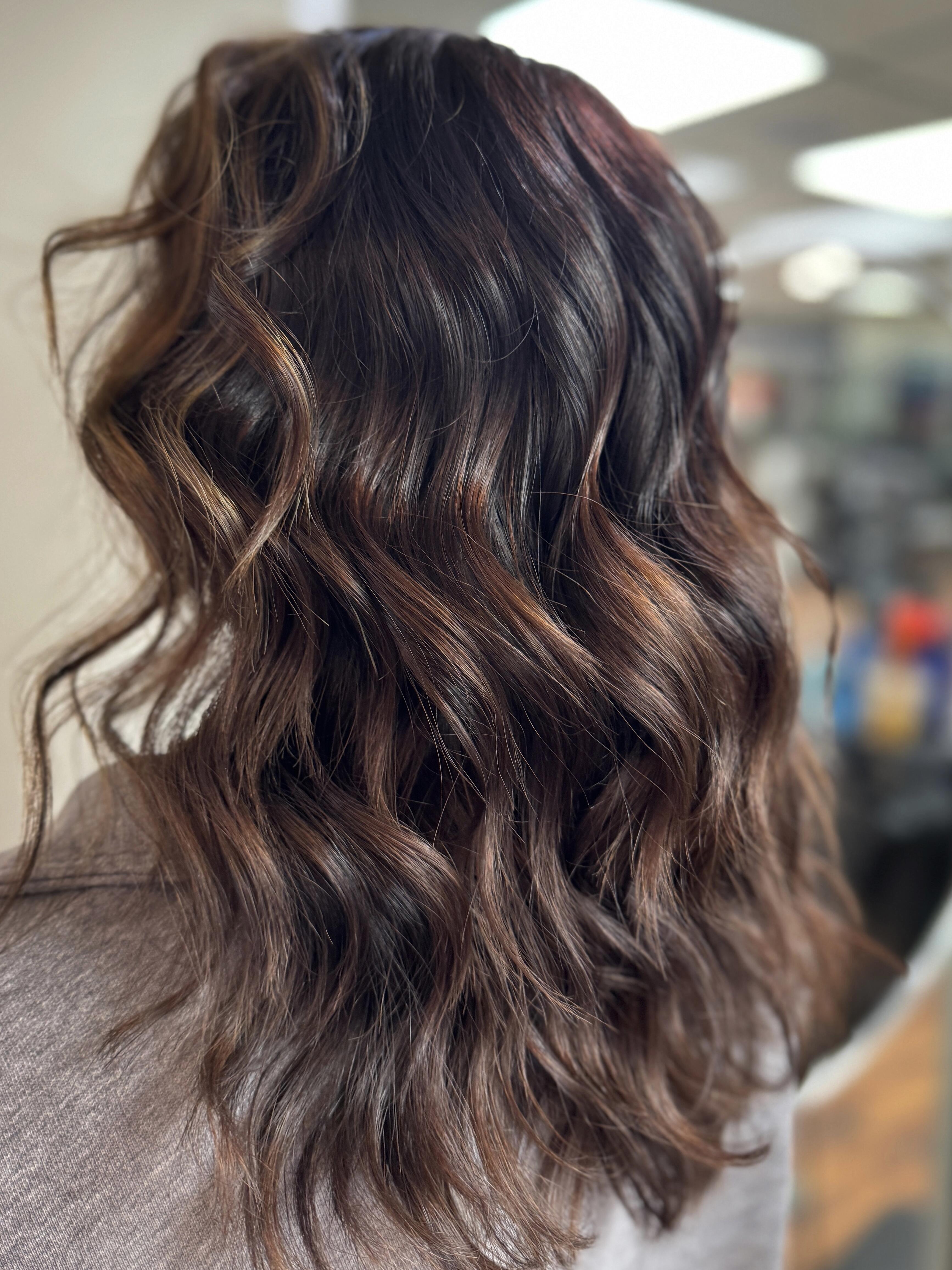 New brunette hair color and beachy wave style